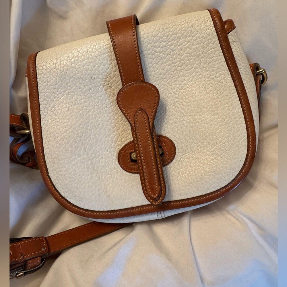 Vintage Dooney&Burke purse white with camel trim.